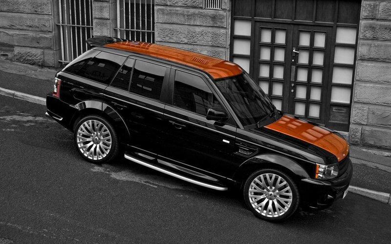 Black and Orange SUV — Dramatic, Photograph, Car, Building