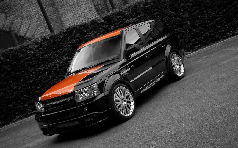 Black and Orange SUV — Dramatic, Photograph, Car, Hedge, Road