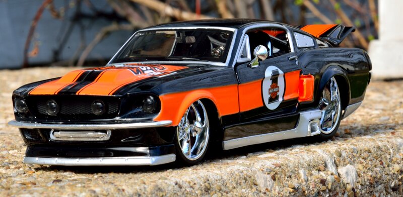 Black and Orange Toy Car — Static