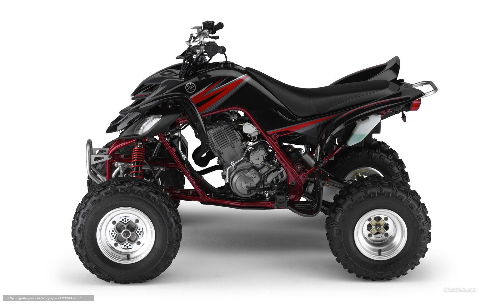 black and red atv side view