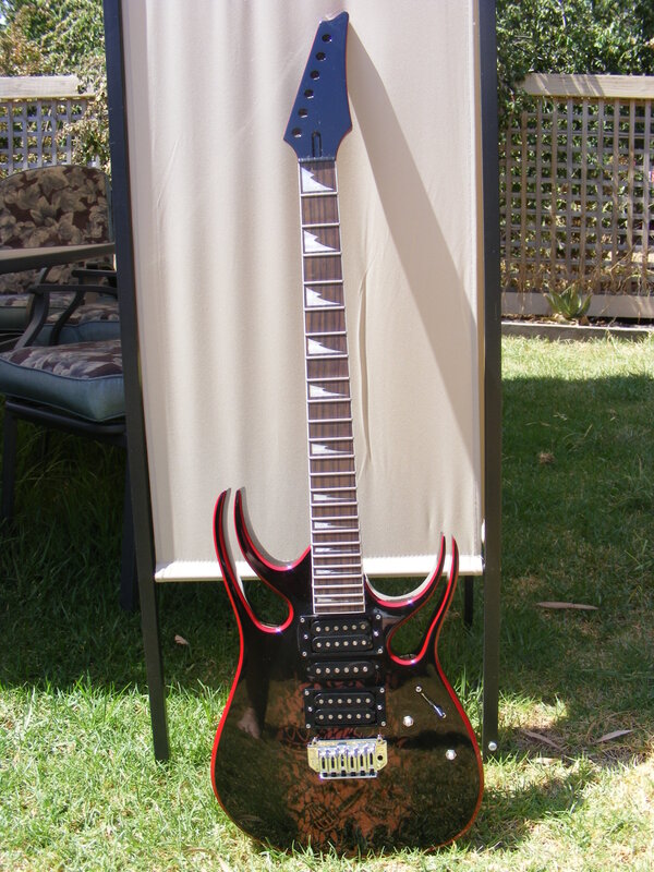 Black and red electric guitar