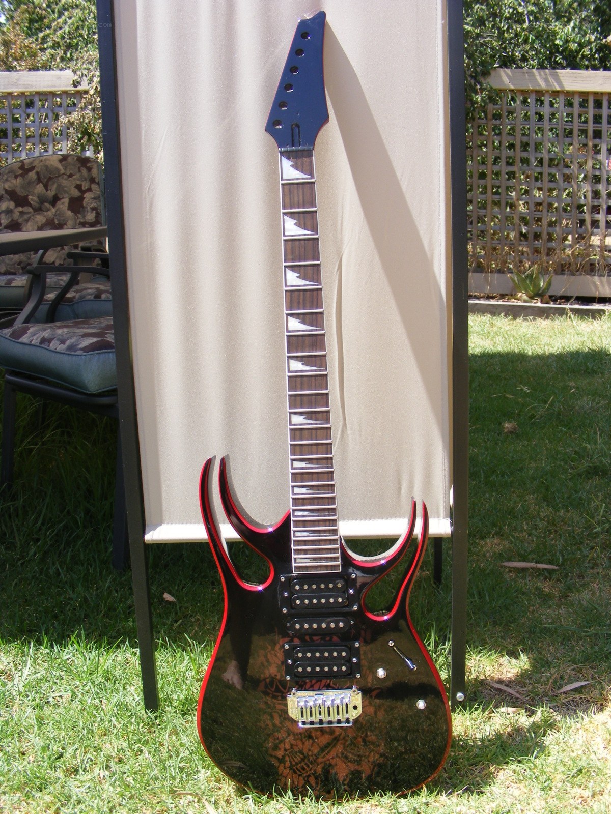 Black and red electric guitar