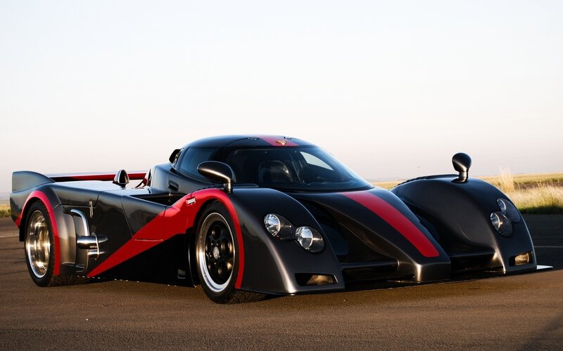 Black and Red Race Car — Dramatic, Sunset