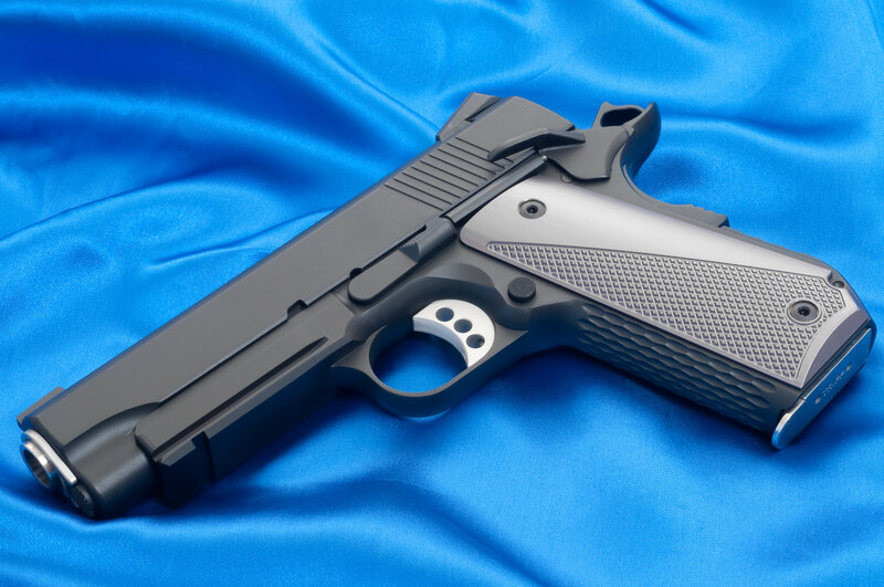 Black and Silver Handgun — Blue
