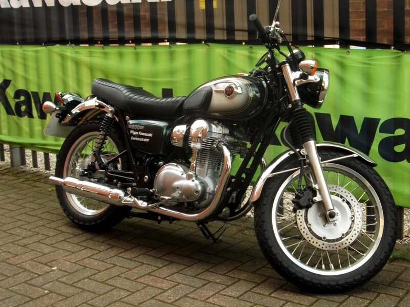 Black and Silver Motorcycle — Neutral, Photograph, Green Banner