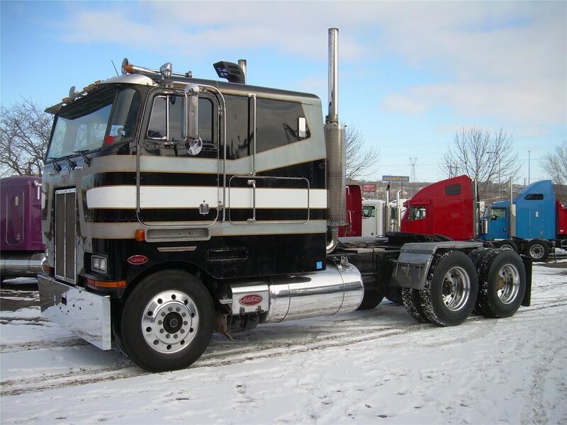 Black and Silver Semi-truck — Cold