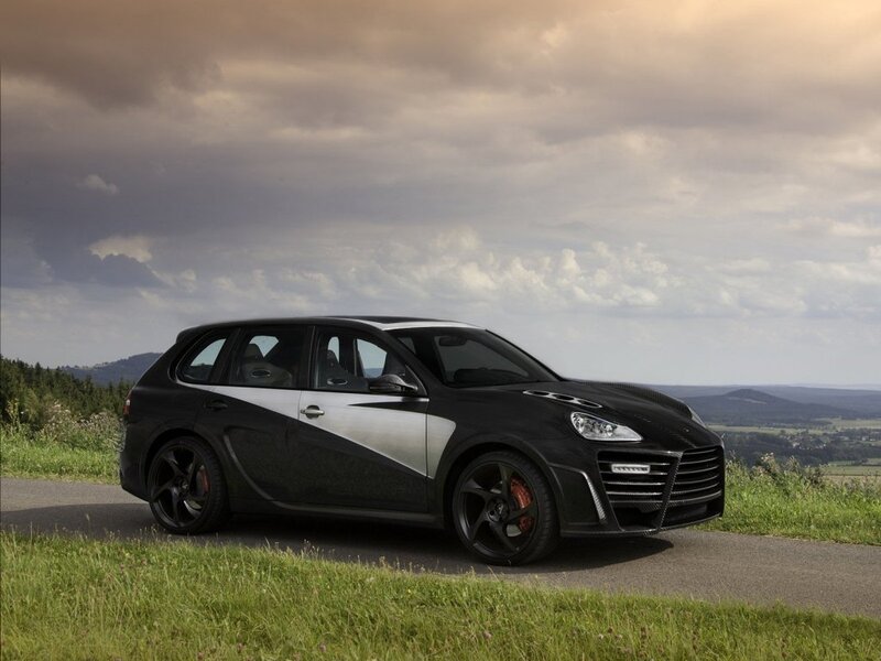 Black and silver sports car on road