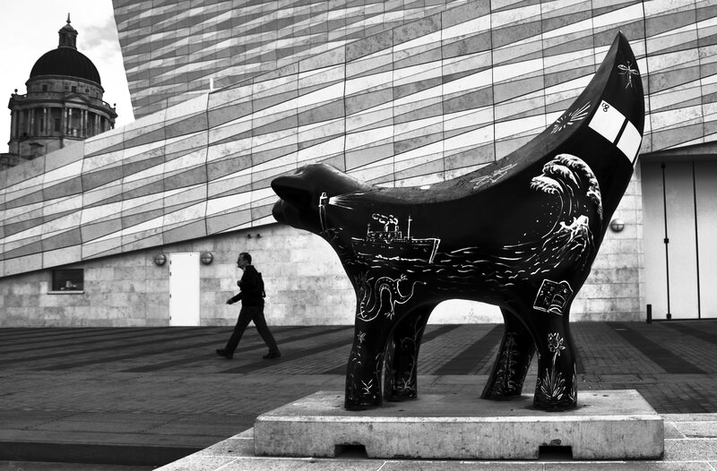 Black and white cat sculpture