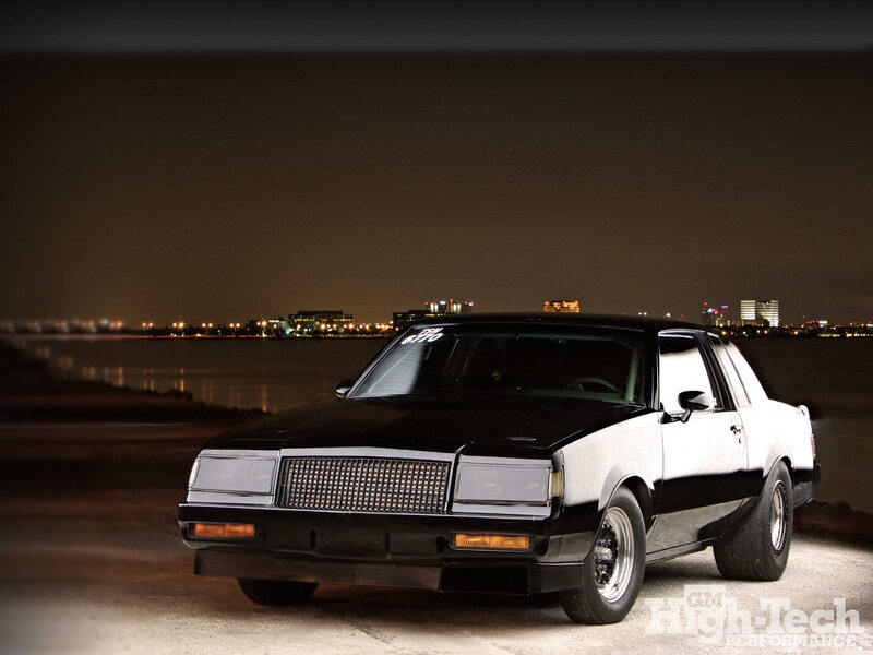 Black and white classic car at night