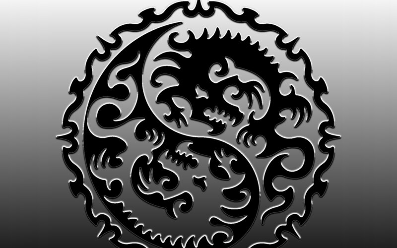 black and white dragon yin yang symbol