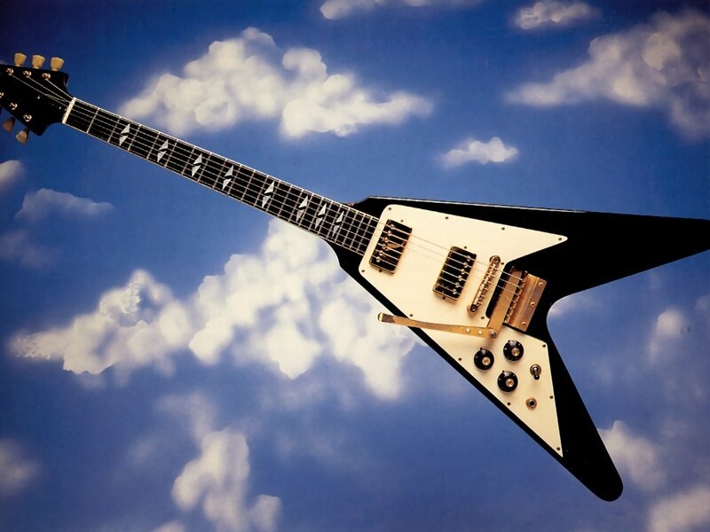 Black and White Electric Guitar — Blue