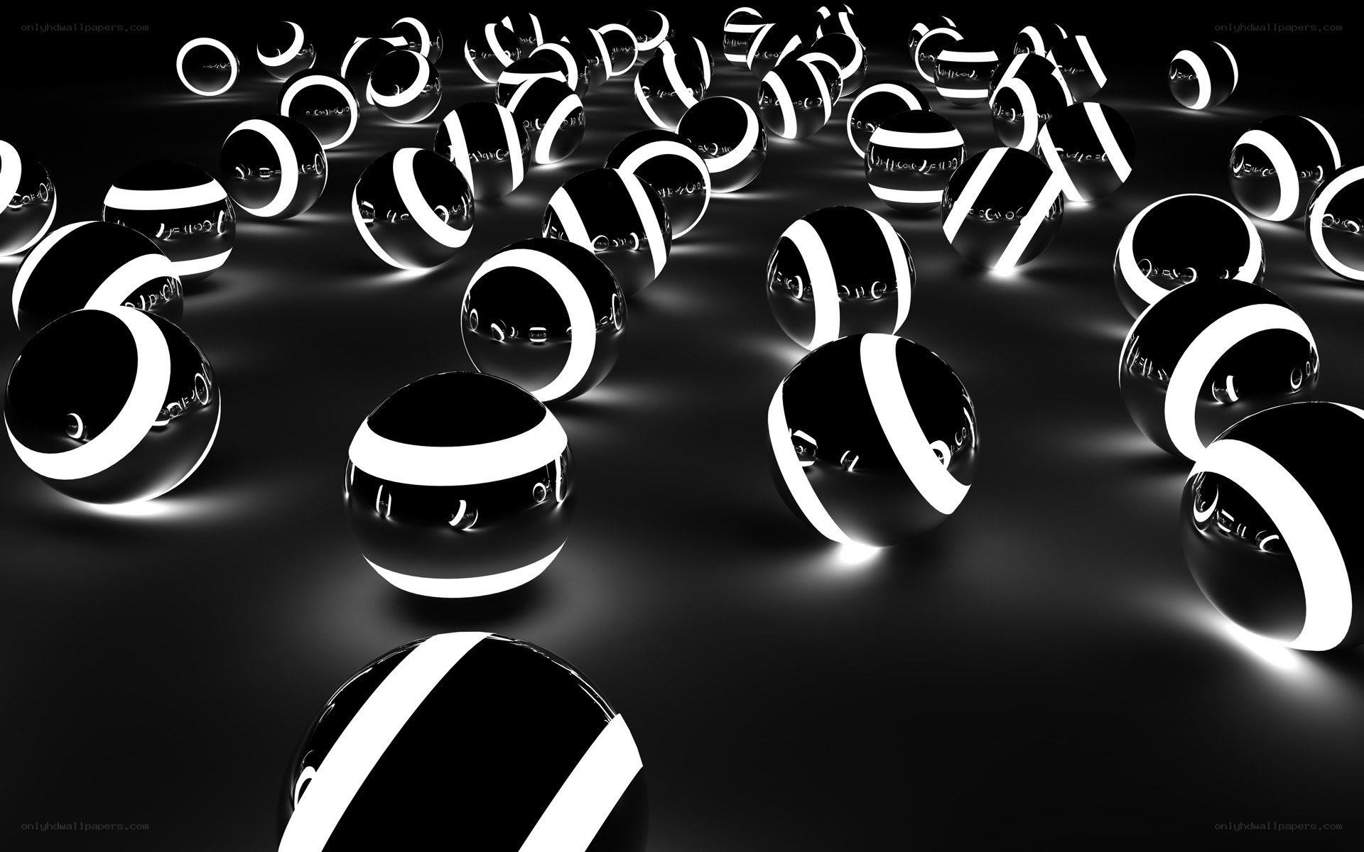 Black and white glowing spheres