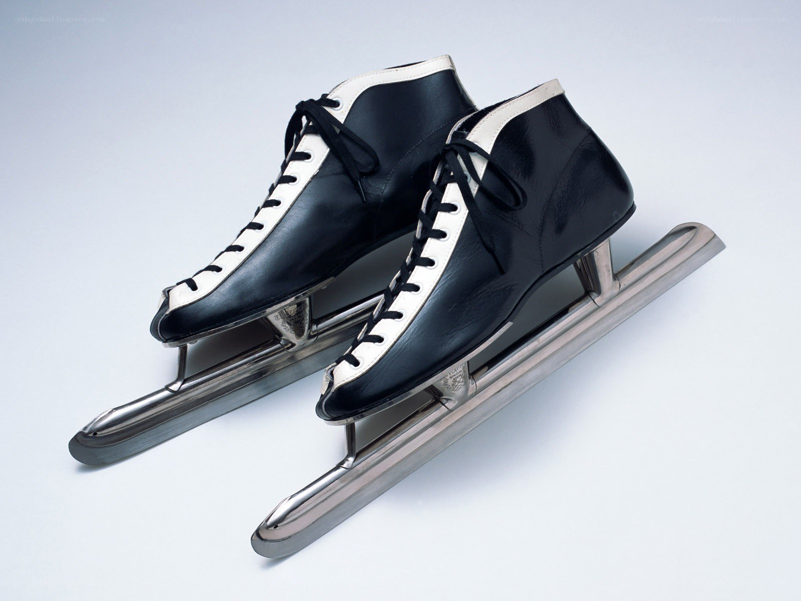 black and white ice skates