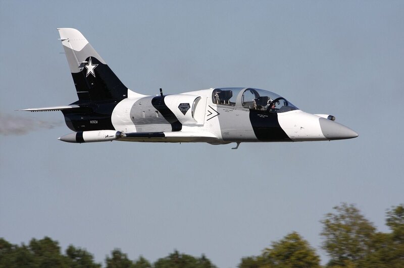 Black and White Jet Aircraft — Dynamic