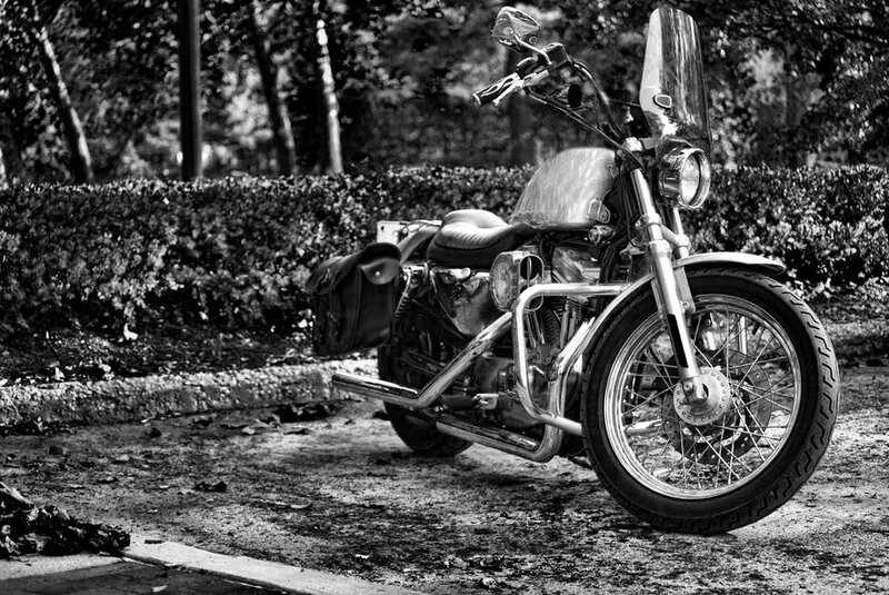 Black and white motorcycle in park