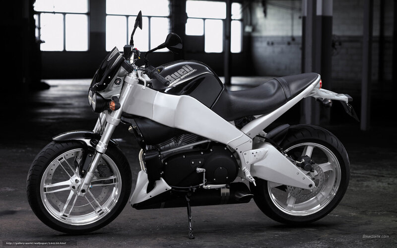 Black and white motorcycle in warehouse