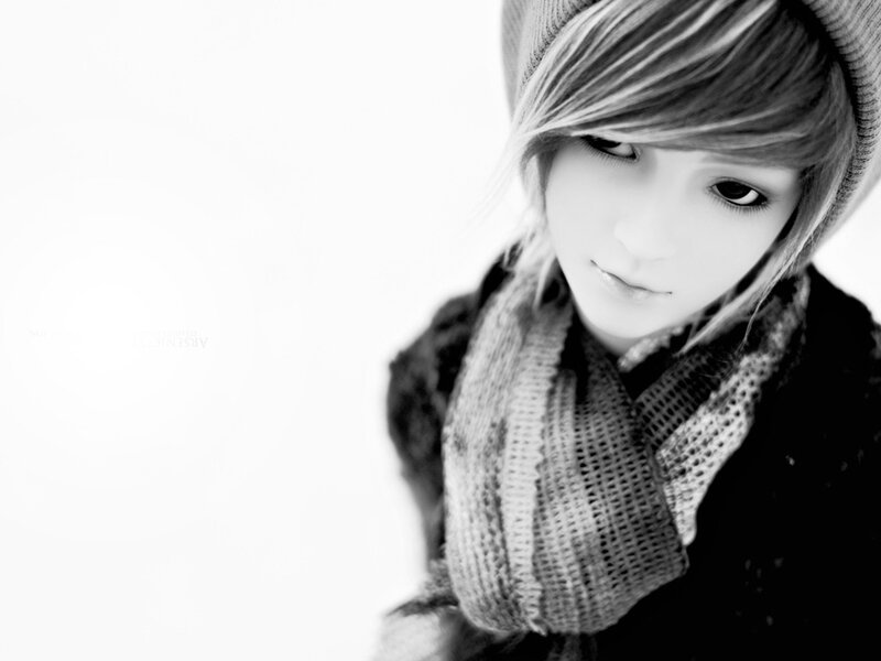 black and white portrait of a doll