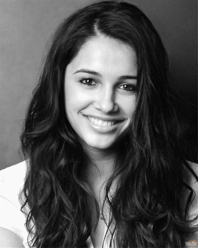 black and white portrait of a smiling woman