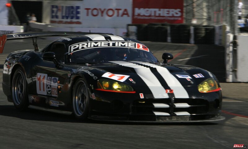 black and white race car on track