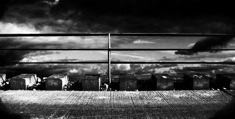 Black and white sky with railing