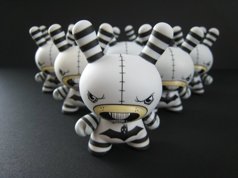 Black and white striped toy figures