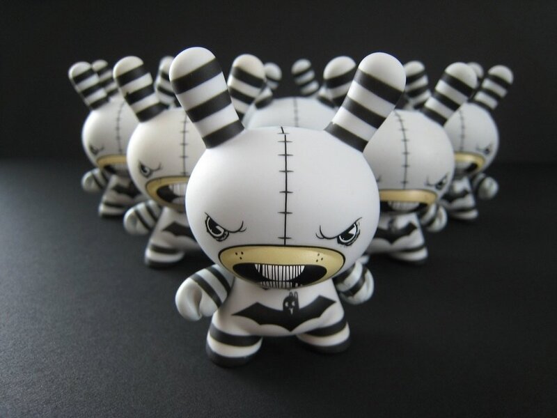 Black and white striped toy figures