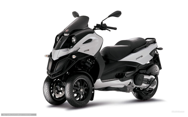 black and white three-wheeled scooter