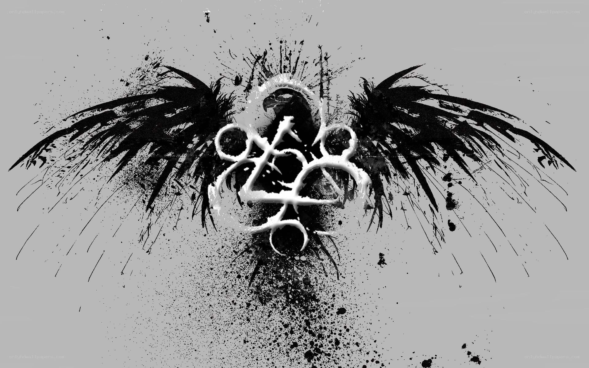 black and white winged symbol