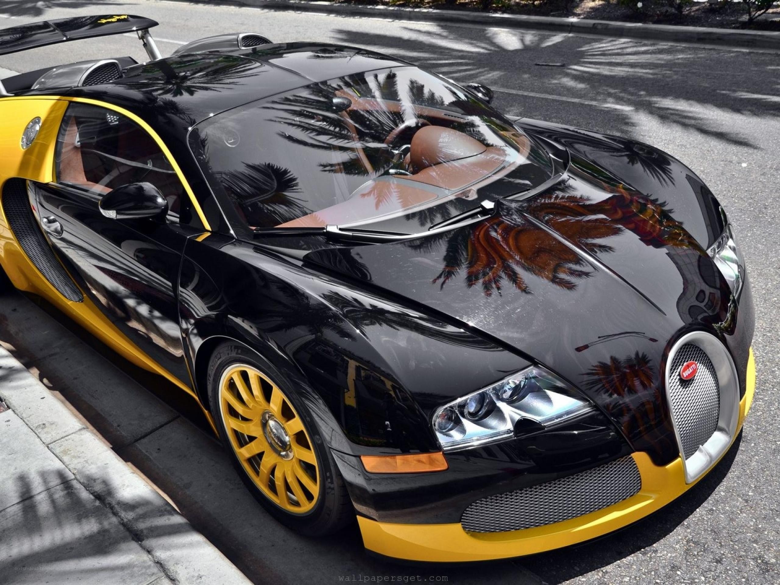 Black and yellow Bugatti Veyron