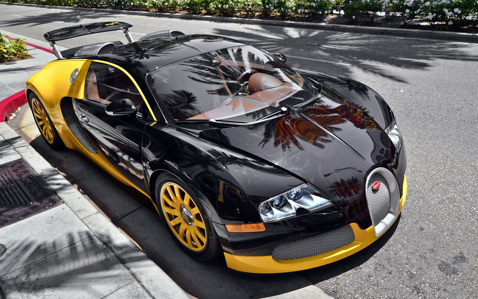 Black and yellow Bugatti Veyron