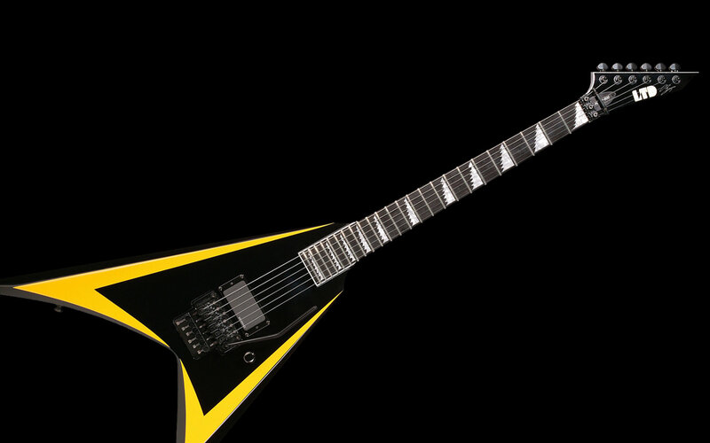 black and yellow electric guitar