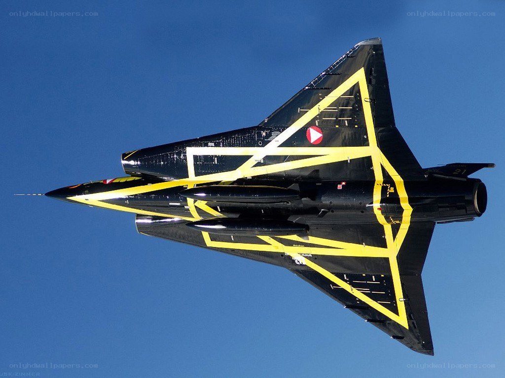 Black and yellow jet in flight