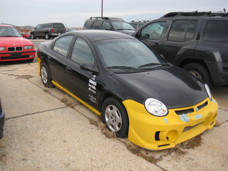 black and yellow modified sedan