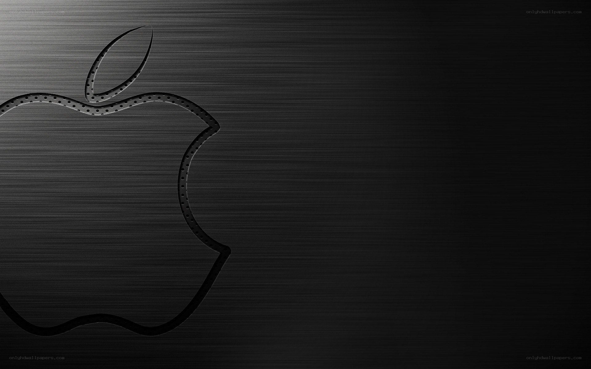 black apple logo on brushed metal