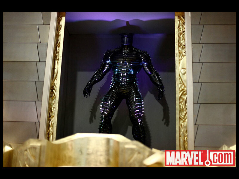 Black Armored Figure — Dramatic