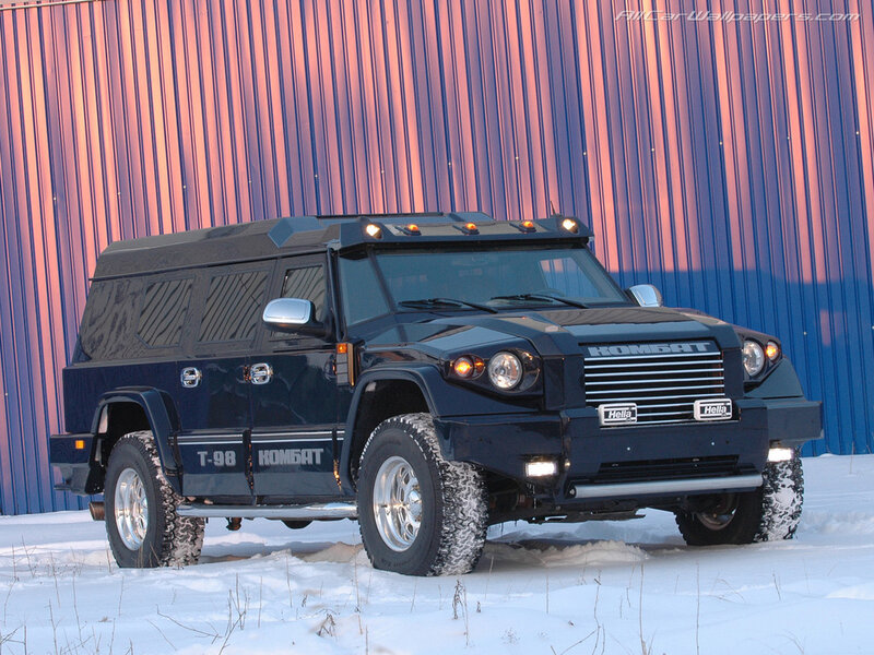 Black armored vehicle in snow