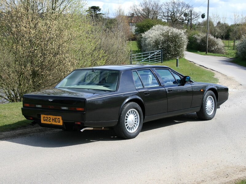 Black Aston Martin Car — Serene