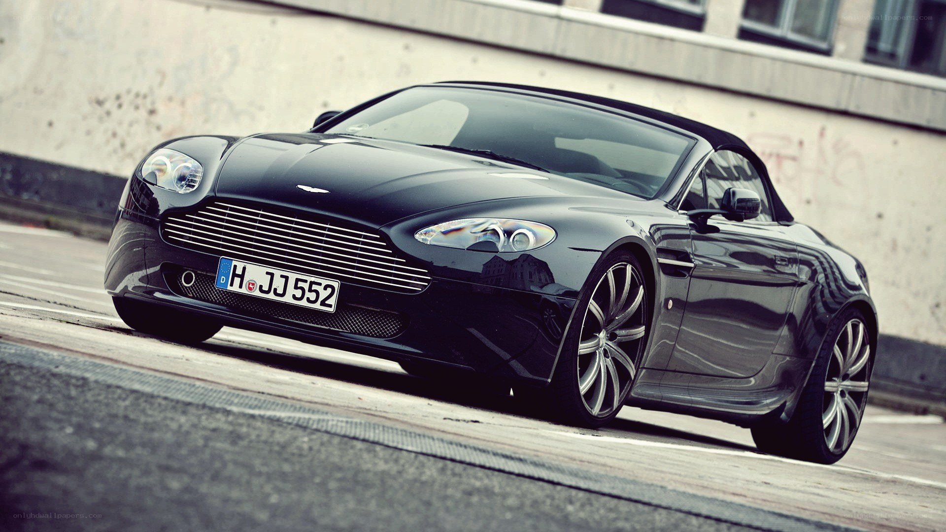 Black Aston Martin convertible