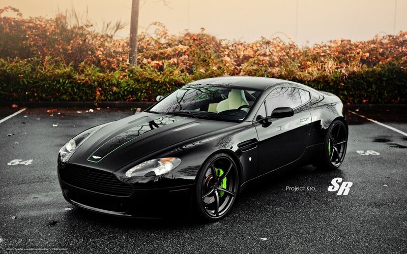 Black Aston Martin in parking lot