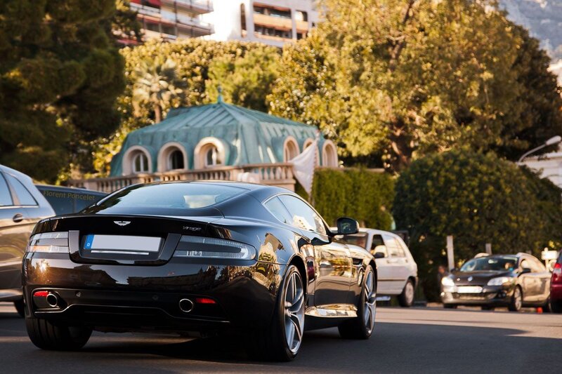 Black Aston Martin on city street