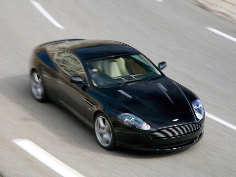 Black Aston Martin on road