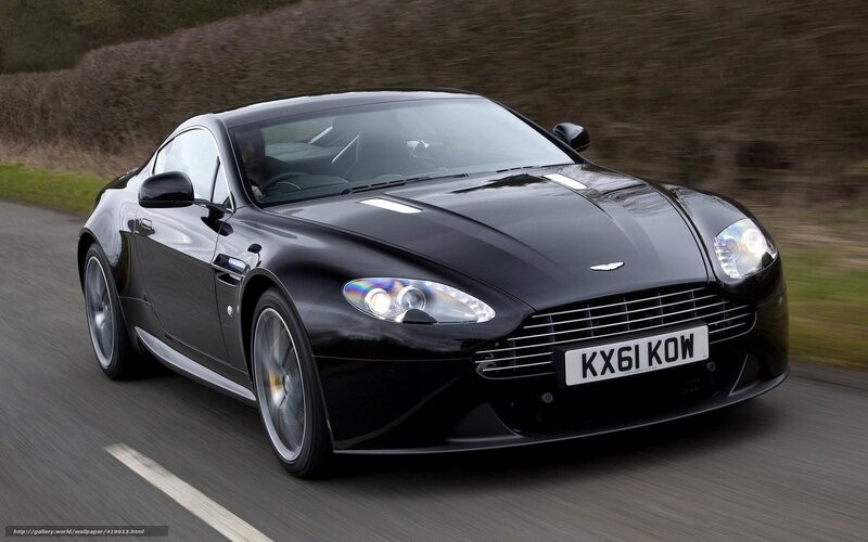 Black Aston Martin on road