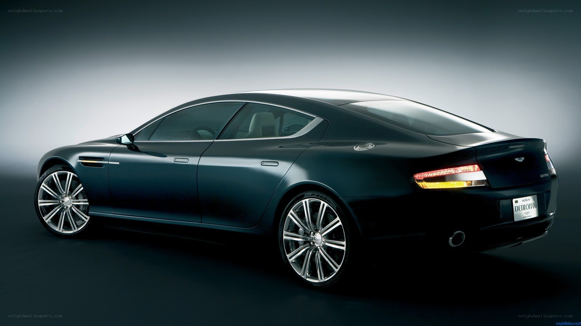 black aston martin sedan