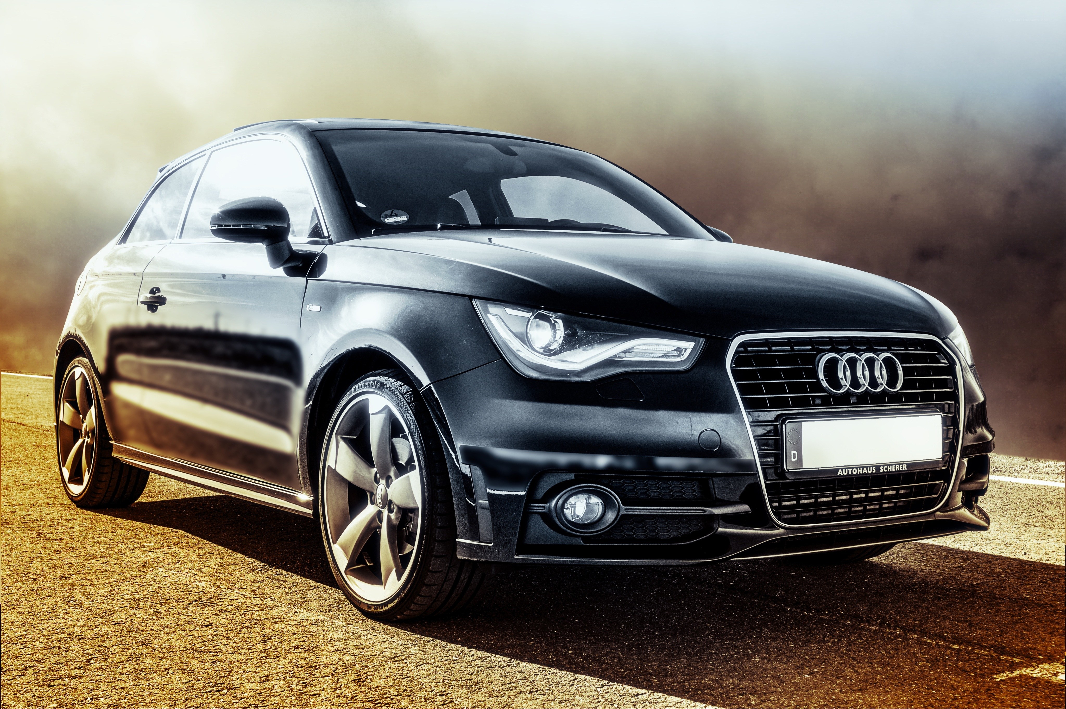 Black Audi A1 on a road