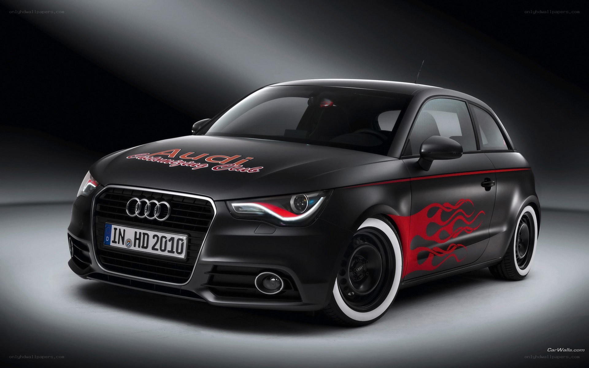Black Audi A1 with flame decals