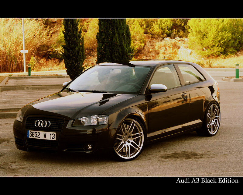 Black Audi A3 in parking lot
