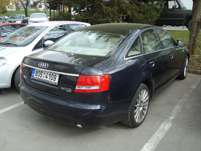 black audi a6 parked in lot