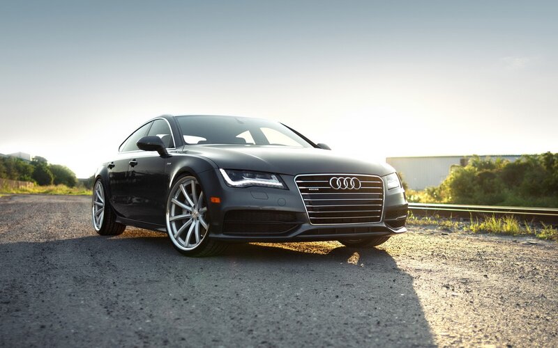 Black Audi A7 on gravel road