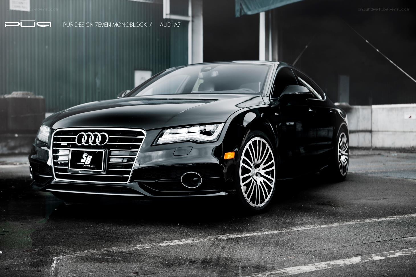 Black Audi A7 with custom wheels