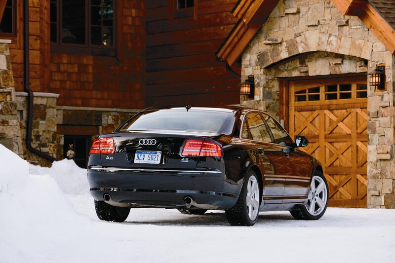 Black Audi A8 in snowy setting